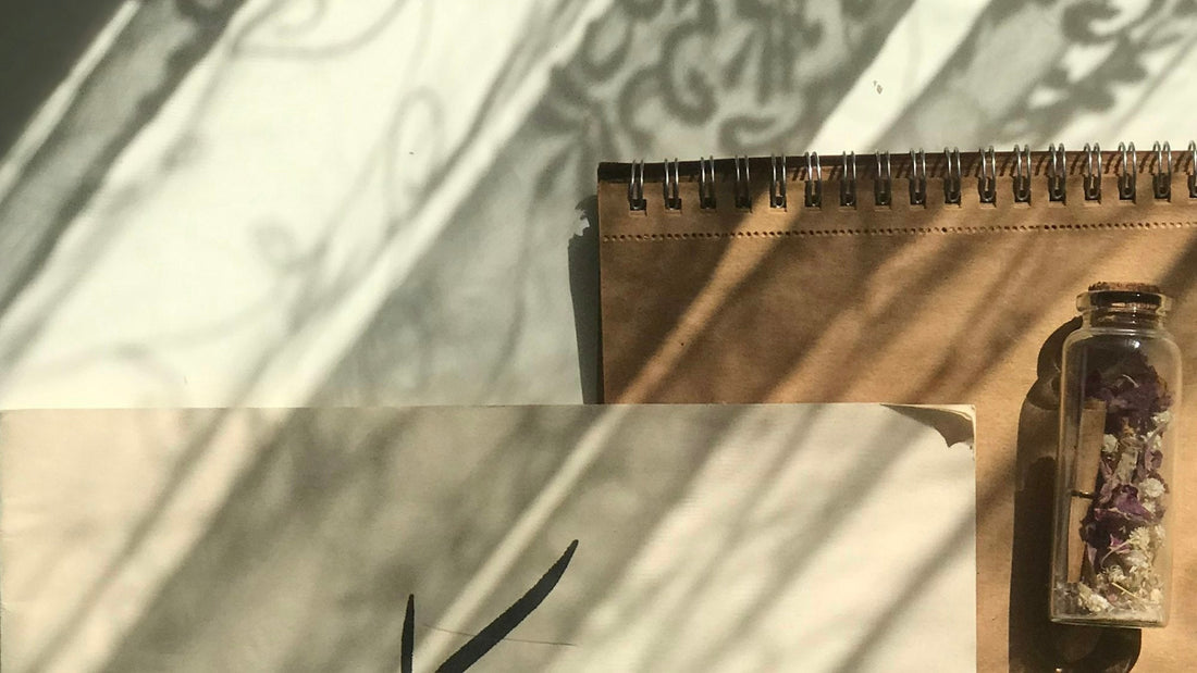 Two notebooks filled with handwritten Perso-Arabic script, the form most Urdu manuscripts start in
