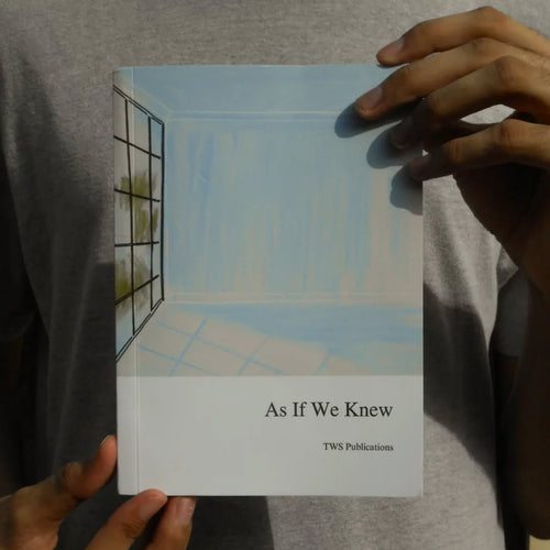 Book titled 'As If We Knew' by TWS Publications held by a person.